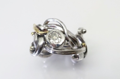 Bague "Lianes" en or gris et or jaune 18ct diamant (taille ancienne) Bague "Lianes" en or gris et or jaune 18ct diamant (taille ancienne)